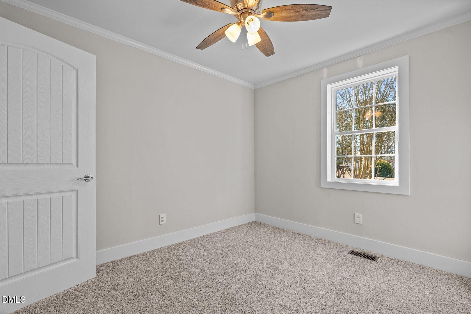1920 Green Path Road Dunn, NC 28334 - Photo 11 of 30 a view of an empty room with a window