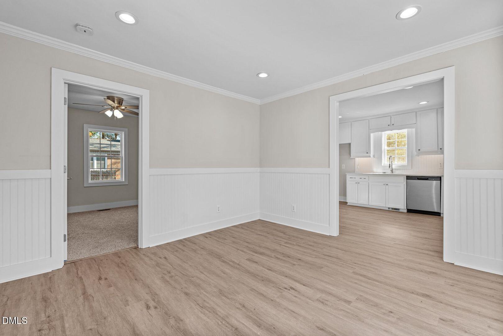 1920 Green Path Road Dunn, NC 28334 - Photo 13 of 30 wooden floor in an empty room with a window