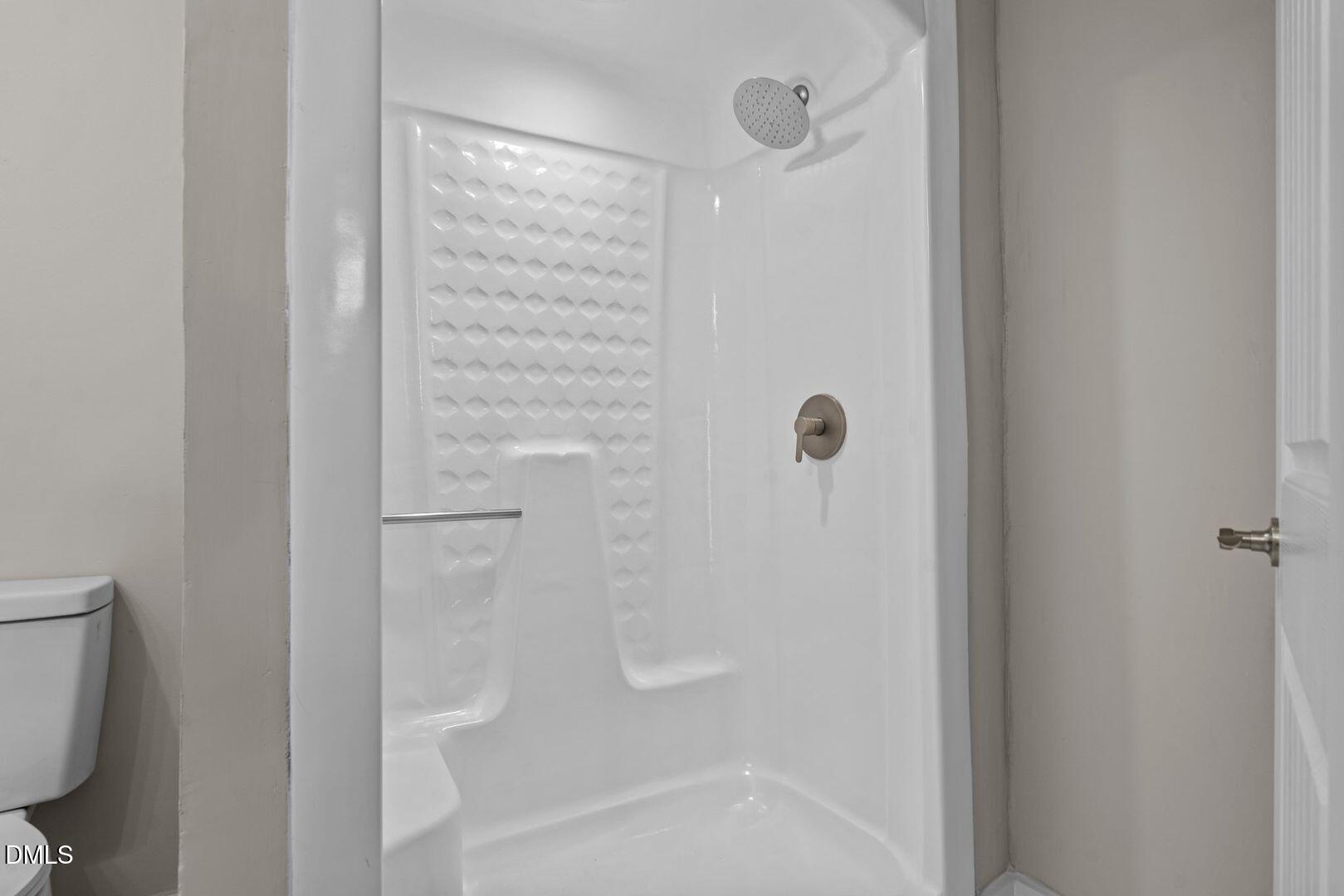 1920 Green Path Road Dunn, NC 28334 - Photo 17 of 30 a bathroom with a shower and a toilet