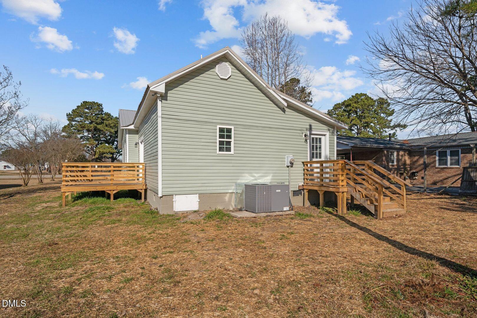 1920 Green Path Road Dunn, NC 28334 - Photo 28 of 30 a view of a house with a yard