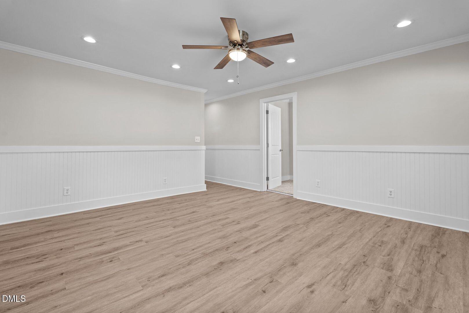 1920 Green Path Road Dunn, NC 28334 - Photo 4 of 30 a view of an empty room with wooden floor