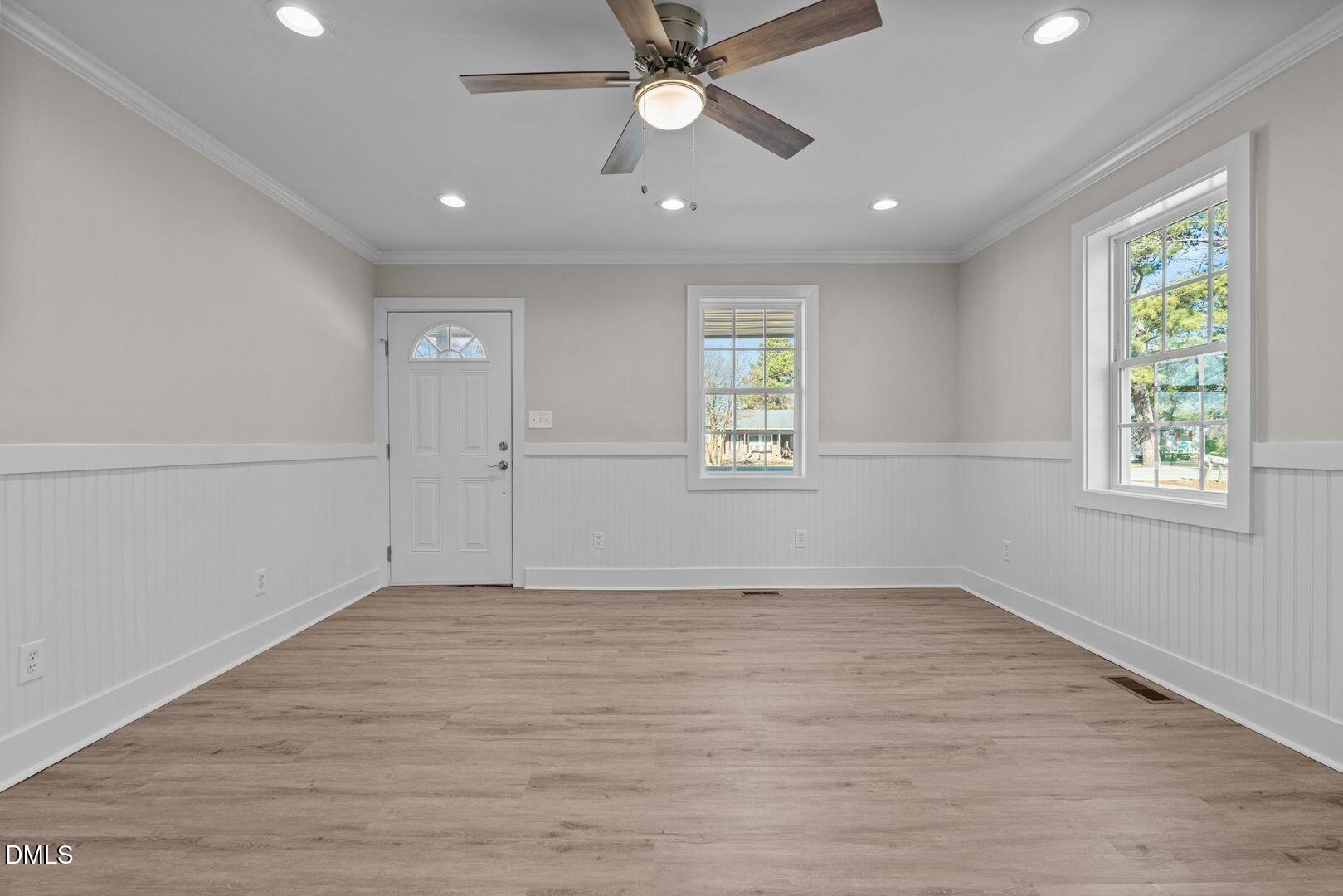 1920 Green Path Road Dunn, NC 28334 - Photo 6 of 30 wooden floor in an empty room with a window