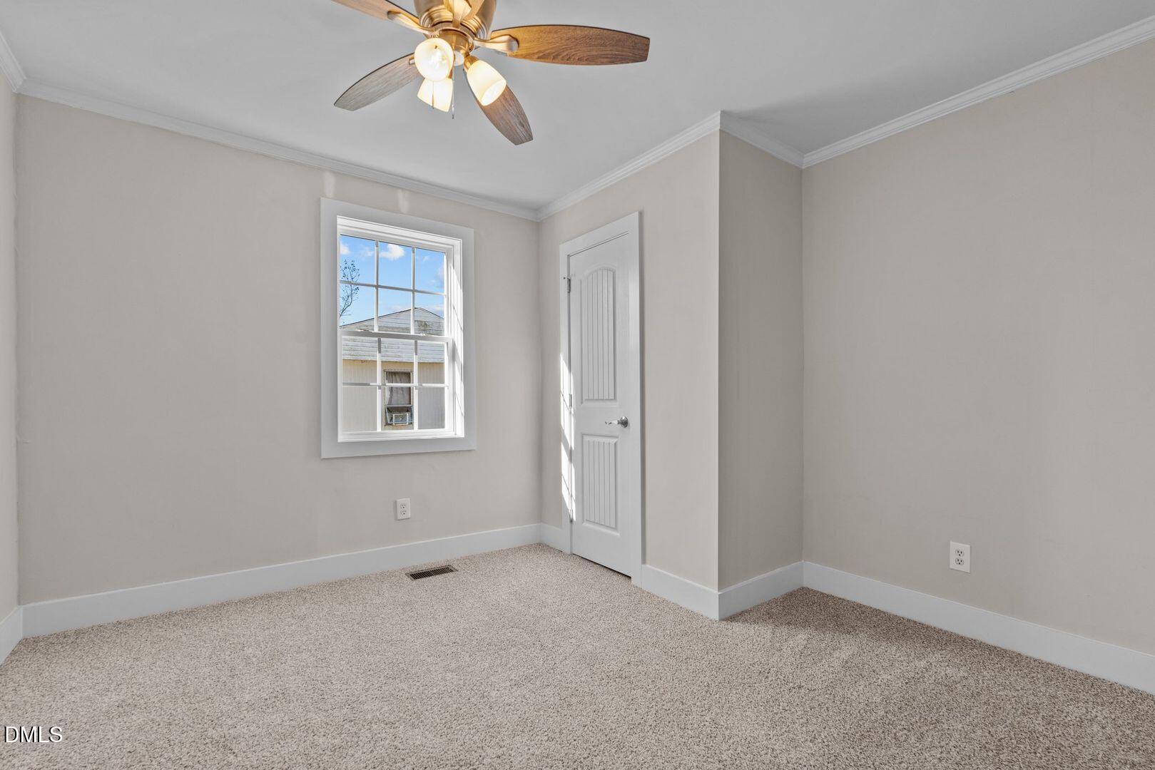 1920 Green Path Road Dunn, NC 28334 - Photo 10 of 30 a view of an empty room with a window