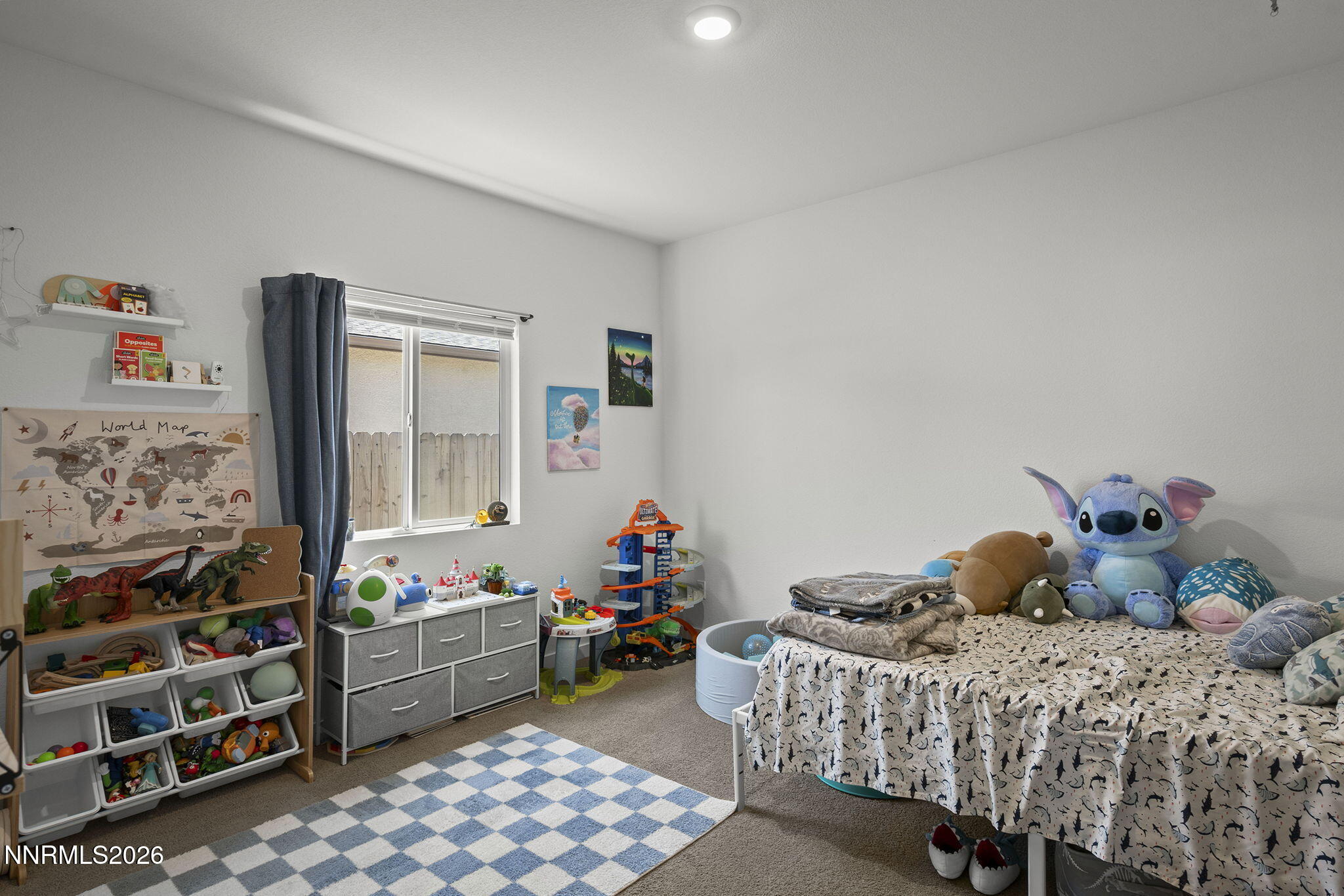 738 Butte Creek Road Dayton, NV 89403 - Photo 16 of 28 a bedroom with a bed and a window