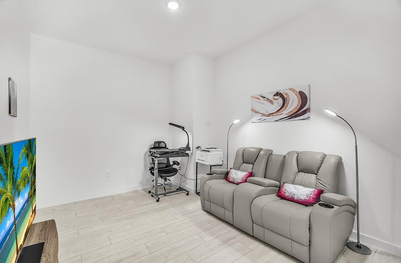19567 Weathervane Way Loxahatchee, FL 33470 - Photo 23 of 49 a living room with furniture and a couch