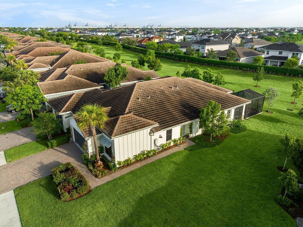 19567 Weathervane Way Loxahatchee, FL 33470 - Photo 33 of 49 an aerial view of a house having swimming pool garden and patio