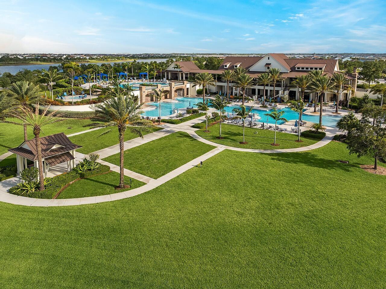 19567 Weathervane Way Loxahatchee, FL 33470 - Photo 38 of 49 a view of a swimming pool and lake