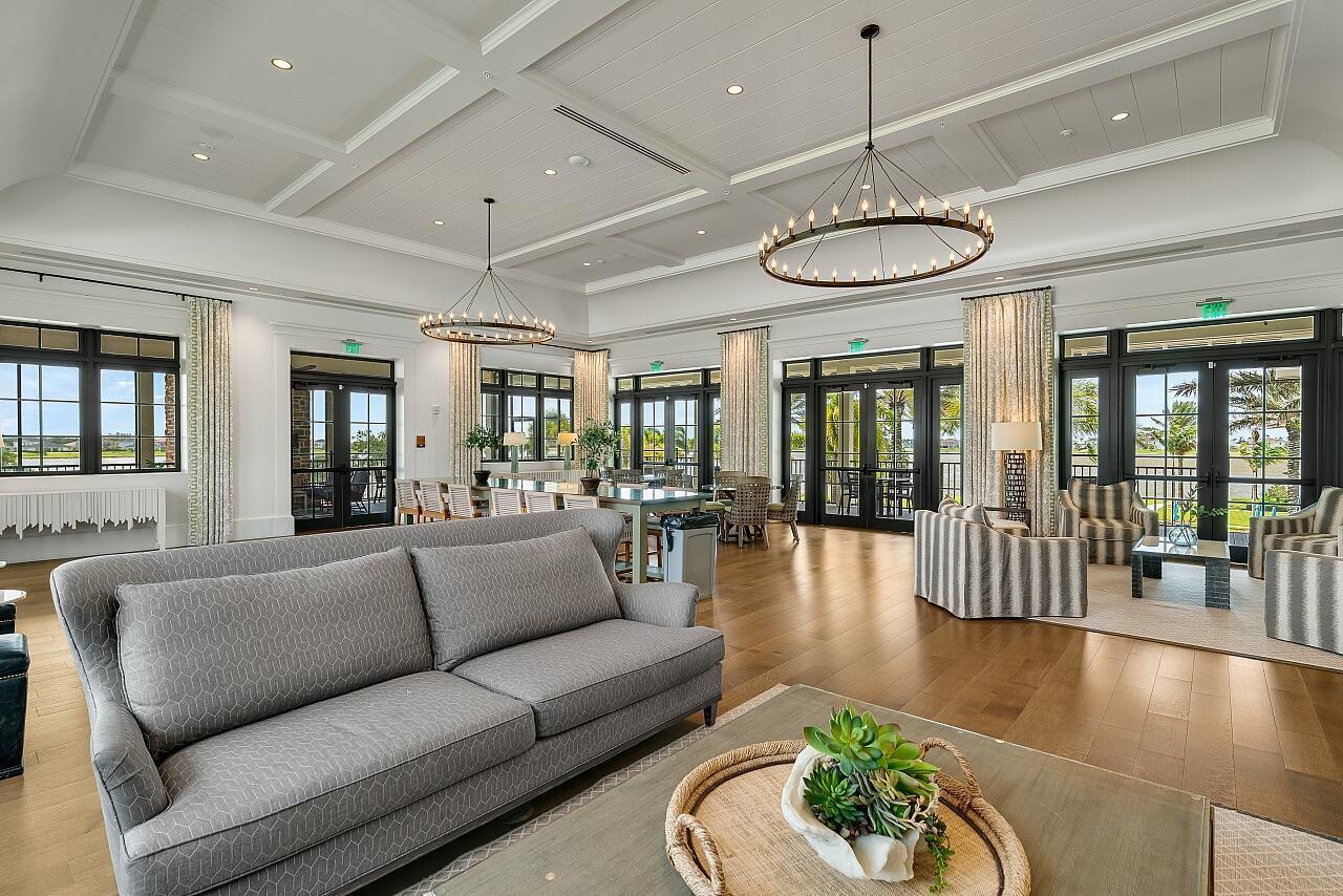 19567 Weathervane Way Loxahatchee, FL 33470 - Photo 42 of 49 a living room with furniture and floor to ceiling window