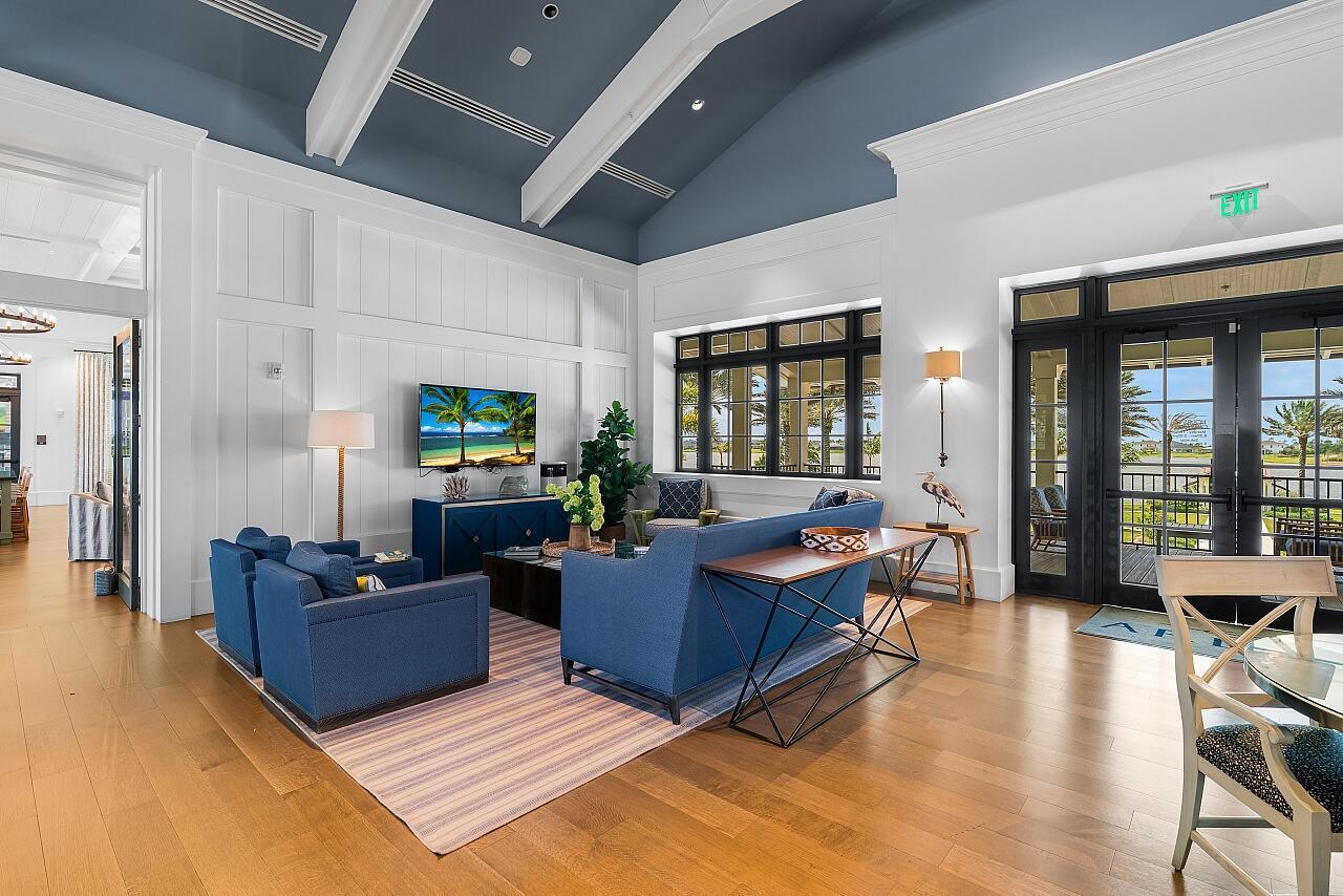 19567 Weathervane Way Loxahatchee, FL 33470 - Photo 43 of 49 a living room with fireplace furniture and a wooden floor