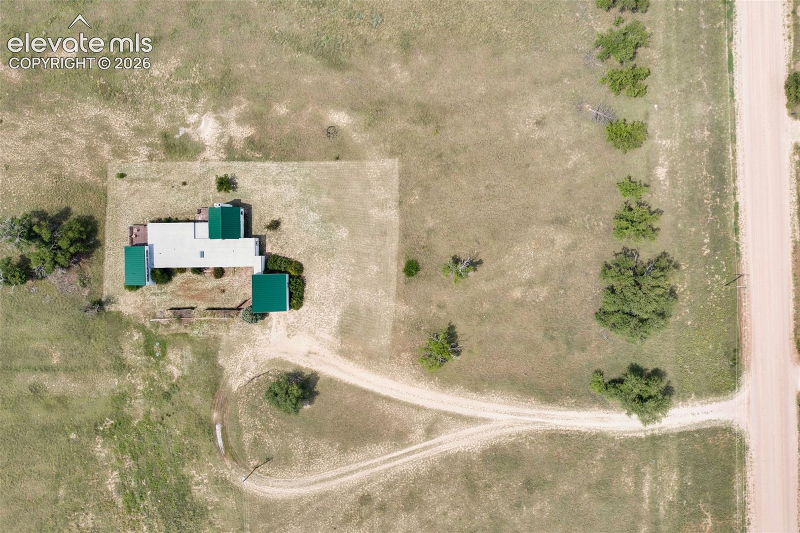 24975 Sanborn Road Calhan, CO 80808 - Photo 44 of 50 Circular driveway. Sanborn Rd. is on the right