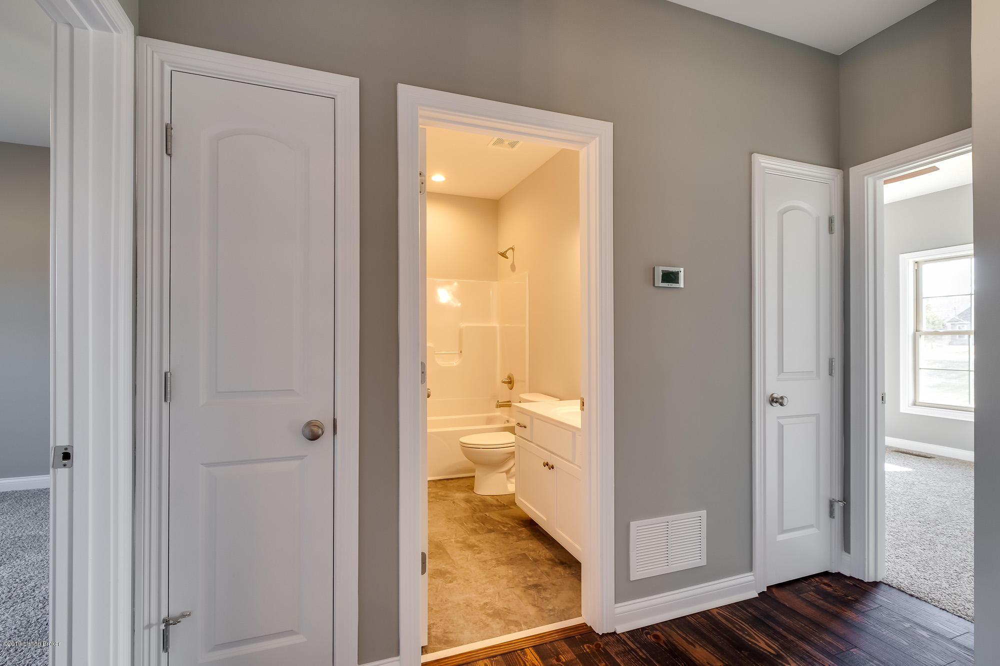 328 Cedar Run Road Pendleton, KY 40055 - Photo 19 of 39 To the right of the living room. a hallway gives access to the full bathroom, two spacious bedrooms, and the laundry room.