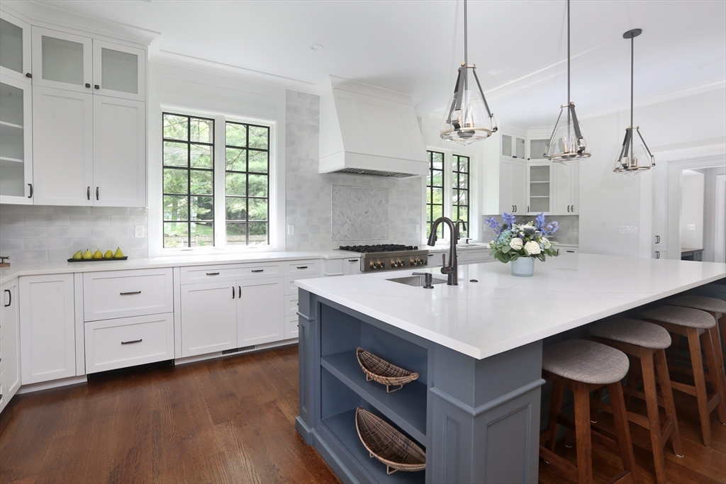 194 Hobart Road Newton, MA 02467 - Photo 11 of 37 a kitchen with a sink a window and cabinets