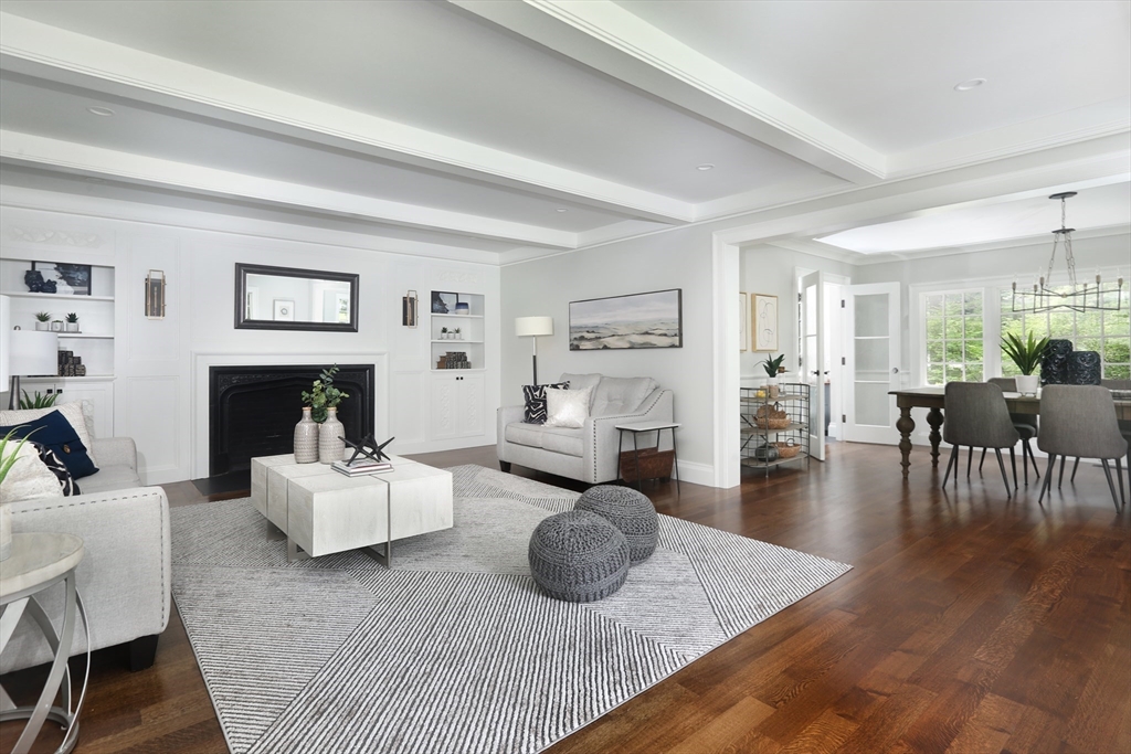 194 Hobart Road Newton, MA 02467 - Photo 14 of 37 a living room with fireplace furniture and a wooden floor