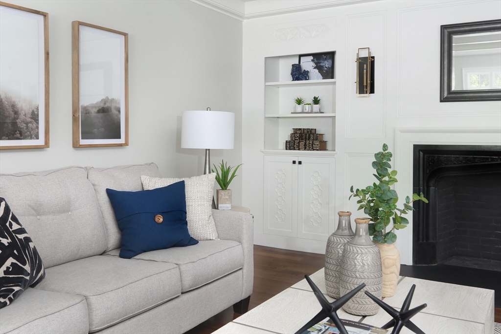 194 Hobart Road Newton, MA 02467 - Photo 15 of 37 a living room with furniture and a potted plant