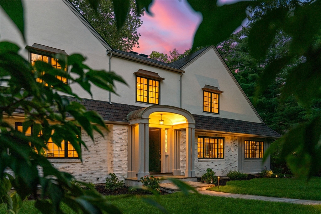 194 Hobart Road Newton, MA 02467 - Photo 2 of 37 a front view of a house with a garden