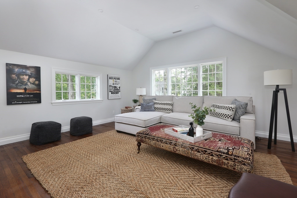 194 Hobart Road Newton, MA 02467 - Photo 27 of 37 a bedroom with a bed and wooden floor