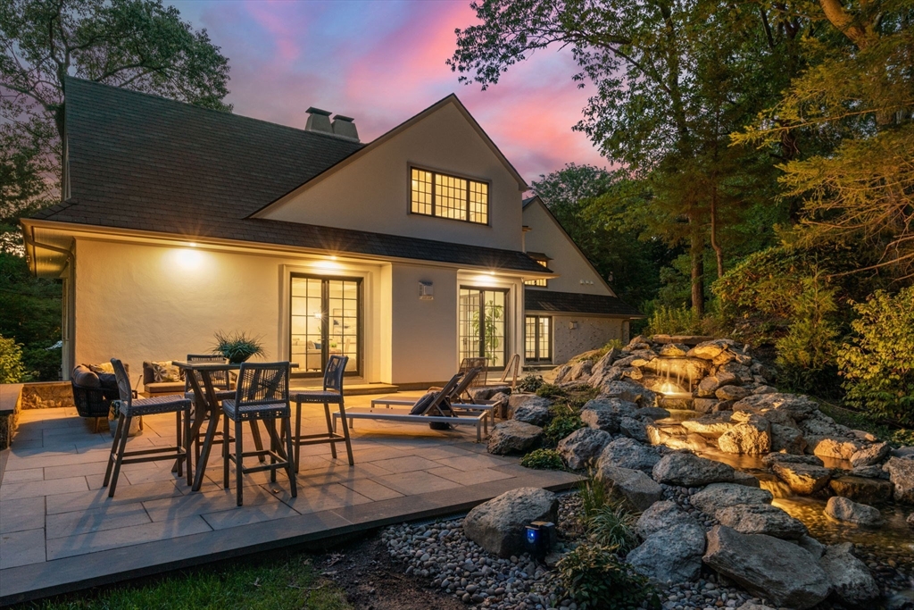 194 Hobart Road Newton, MA 02467 - Photo 30 of 37 a view of a chairs and table in the patio