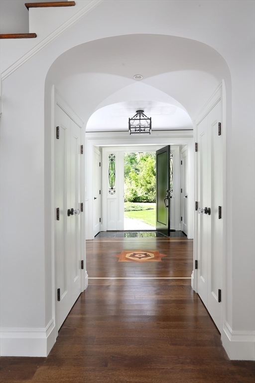 194 Hobart Road Newton, MA 02467 - Photo 3 of 37 a view of an empty room with wooden floor and a window
