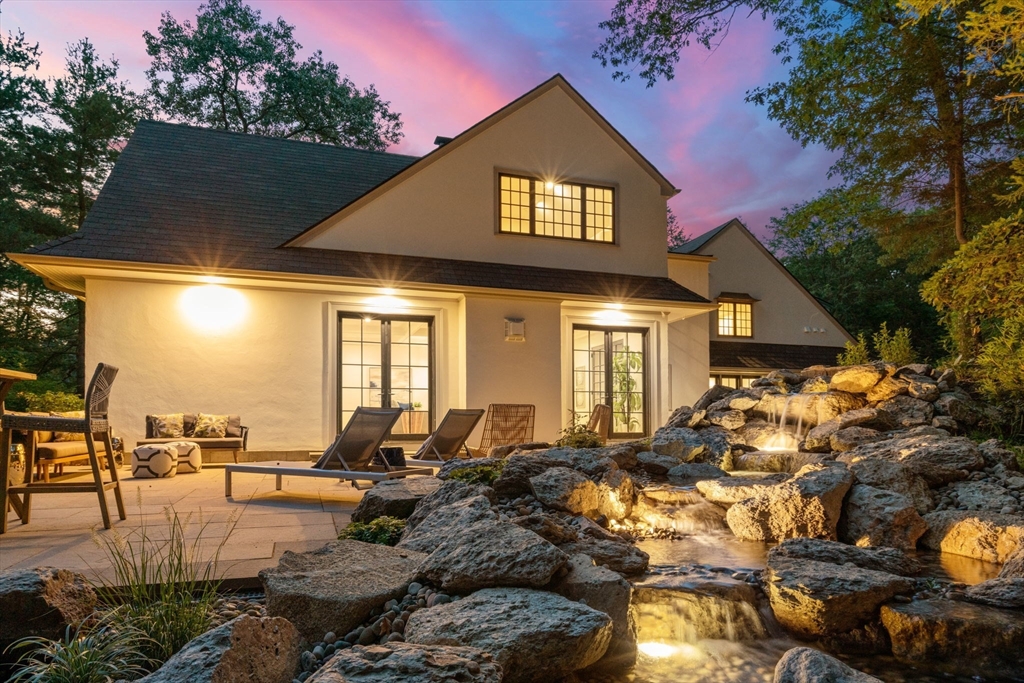 194 Hobart Road Newton, MA 02467 - Photo 31 of 37 a front view of a house with outdoor seating