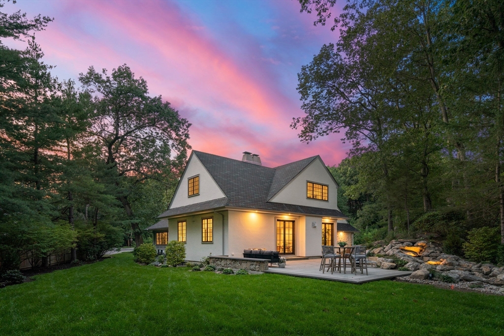 194 Hobart Road Newton, MA 02467 - Photo 33 of 37 a front view of a house with a garden and sitting area