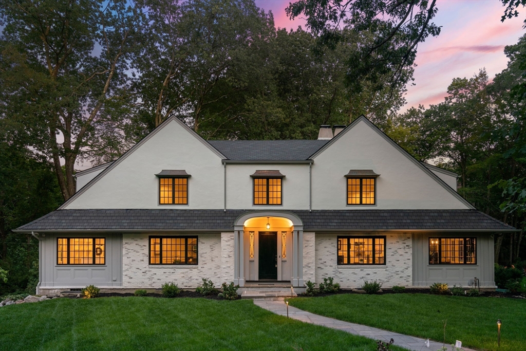 194 Hobart Road Newton, MA 02467 - Photo 37 of 37 a front view of a house with a yard and garage