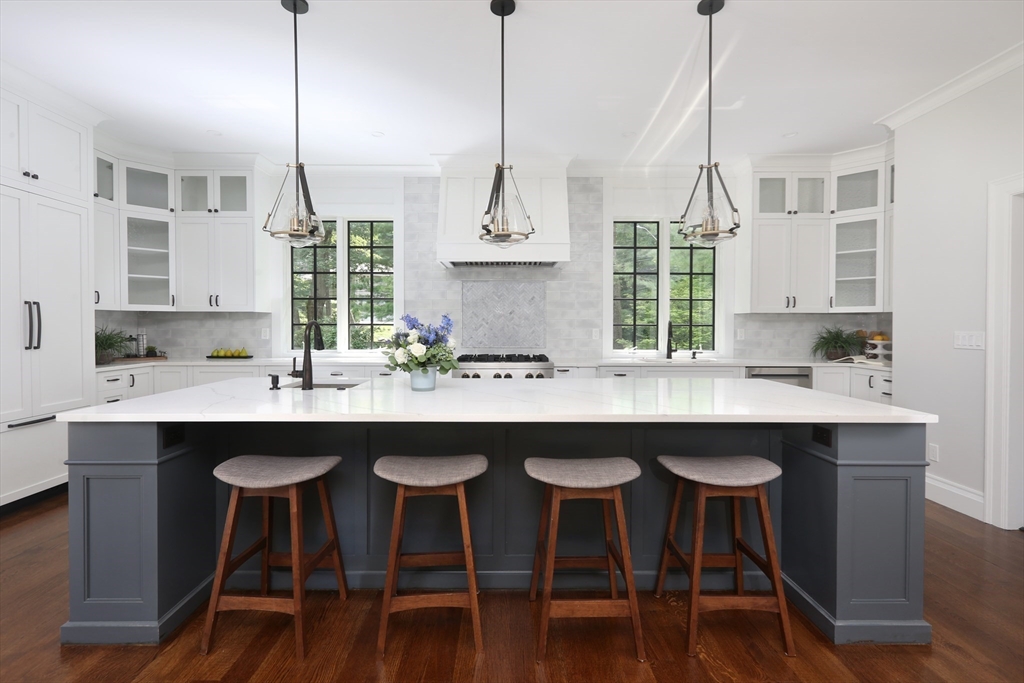 194 Hobart Road Newton, MA 02467 - Photo 9 of 37 a kitchen with a table and chairs in it