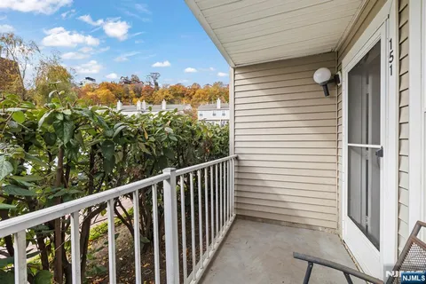 a view of a balcony with an outdoor space