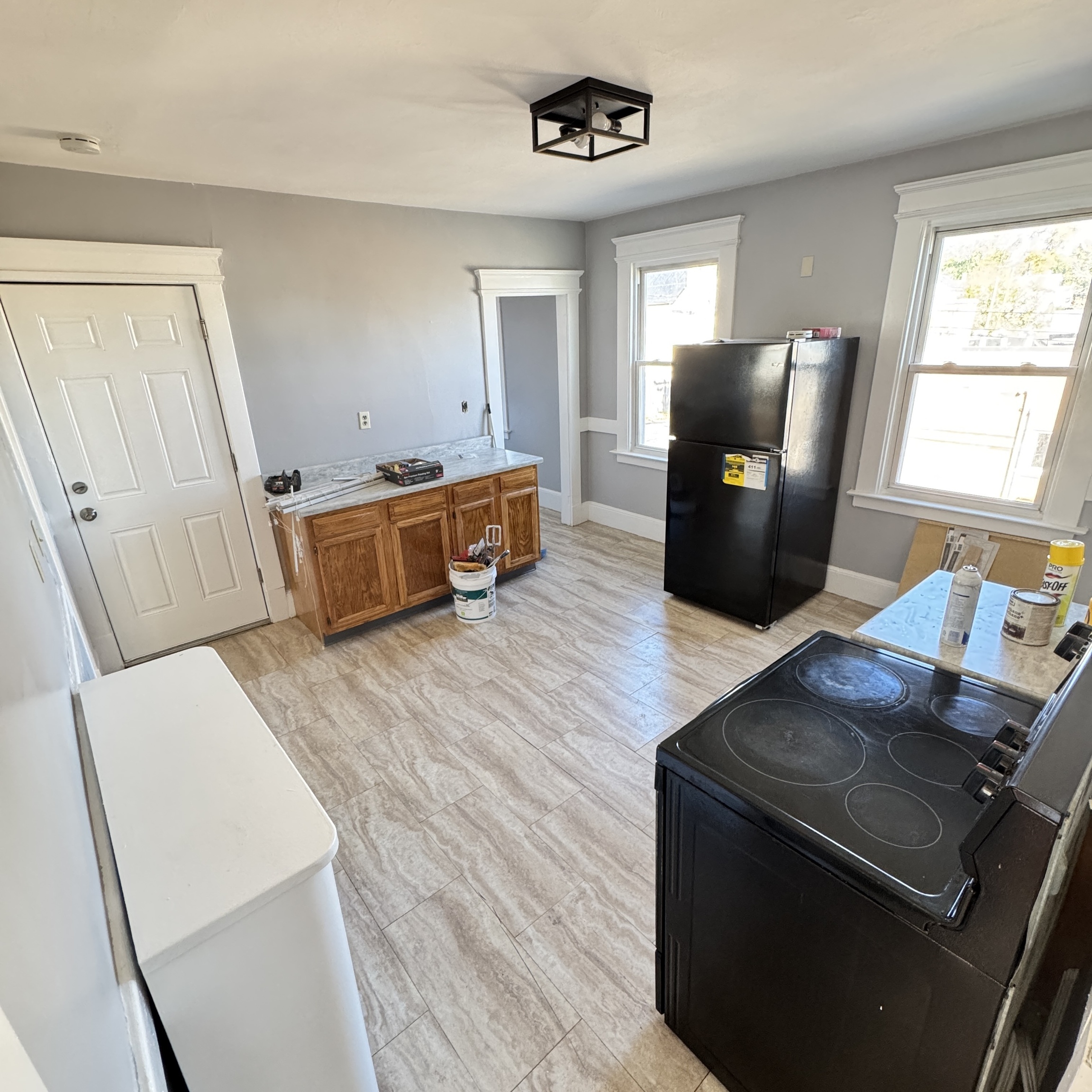 1528 Dixwell Avenue, Unit 2 Hamden, CT 06514 - Photo 8 of 11 a living room with furniture and a flat screen tv