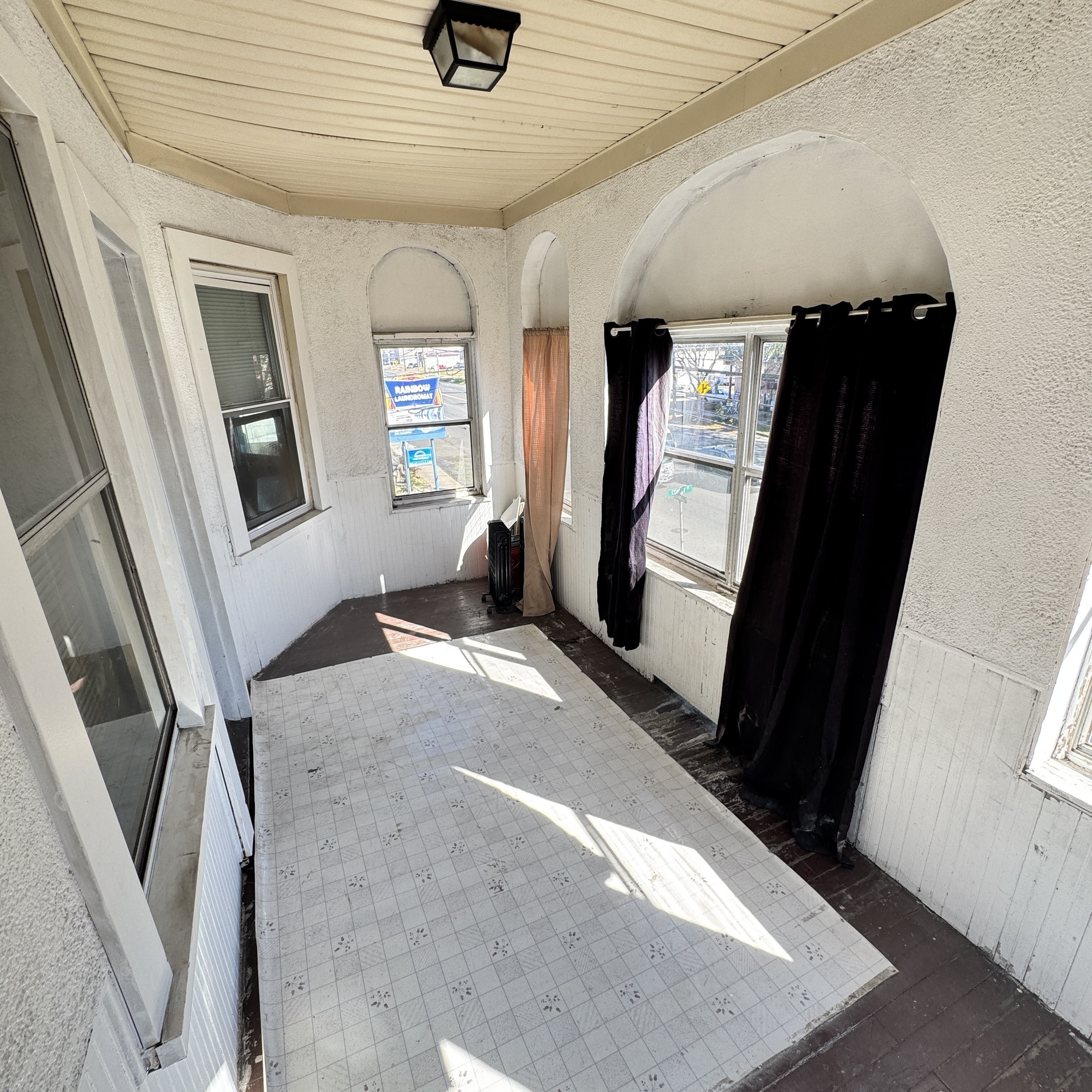 1528 Dixwell Avenue, Unit 2 Hamden, CT 06514 - Photo 10 of 11 a view of a hallway with paintings on the wall