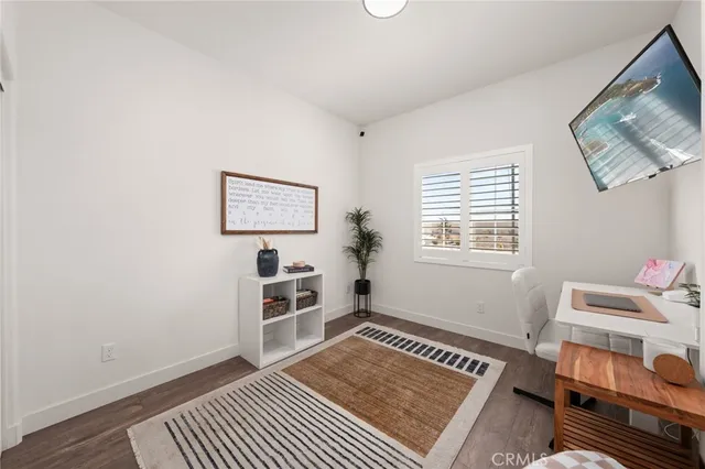 a room with furniture and a window