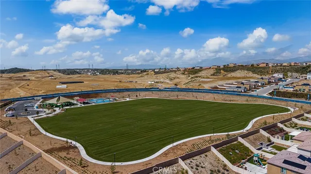 a view of a swimming pool and a lake