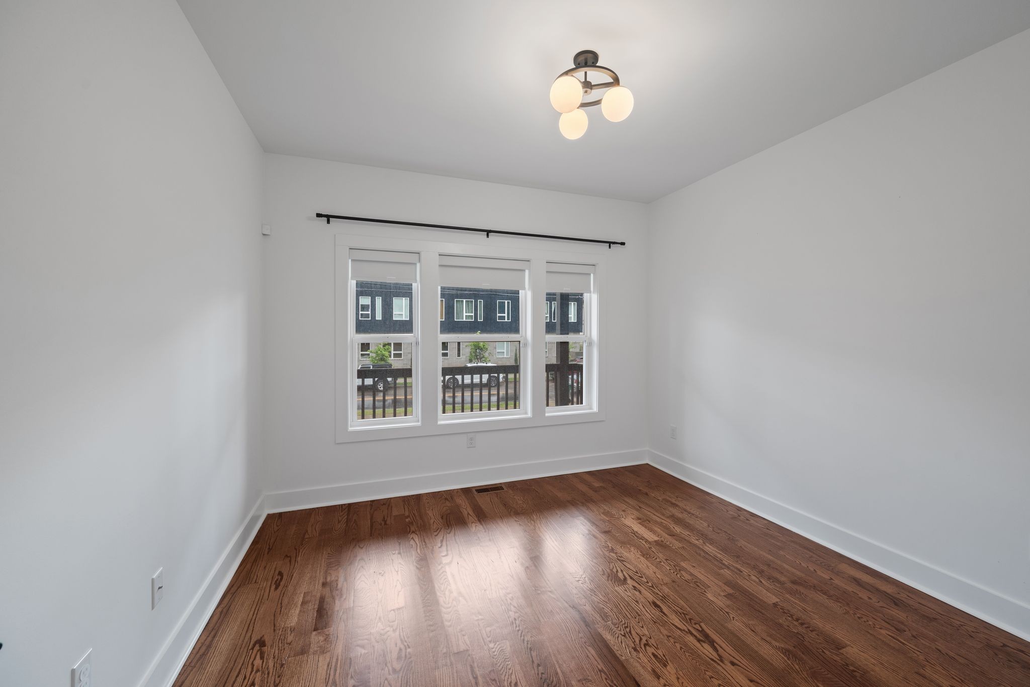 1305 A Lischey Avenue Nashville, TN 37207 - Photo 18 of 30 an empty room with wooden floor and windows