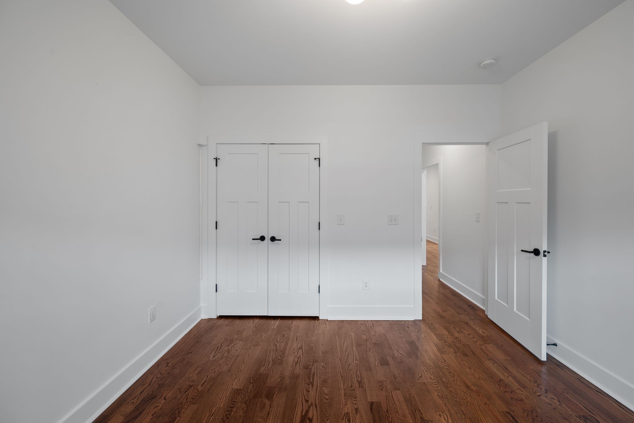 1305 A Lischey Avenue Nashville, TN 37207 - Photo 19 of 30 a view of an empty room with wooden floor