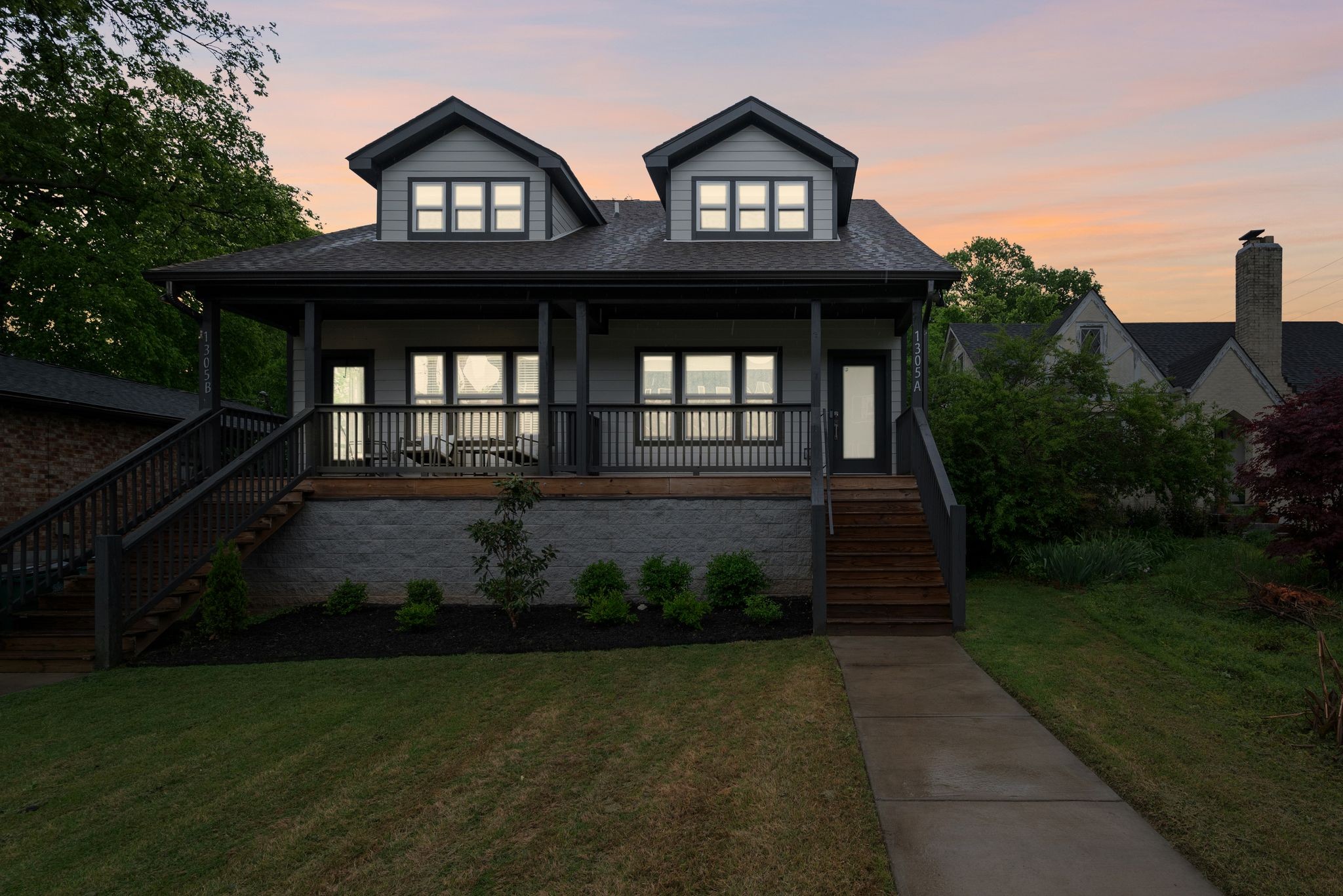 1305 A Lischey Avenue Nashville, TN 37207 - Photo 2 of 30 a front view of a house with a yard