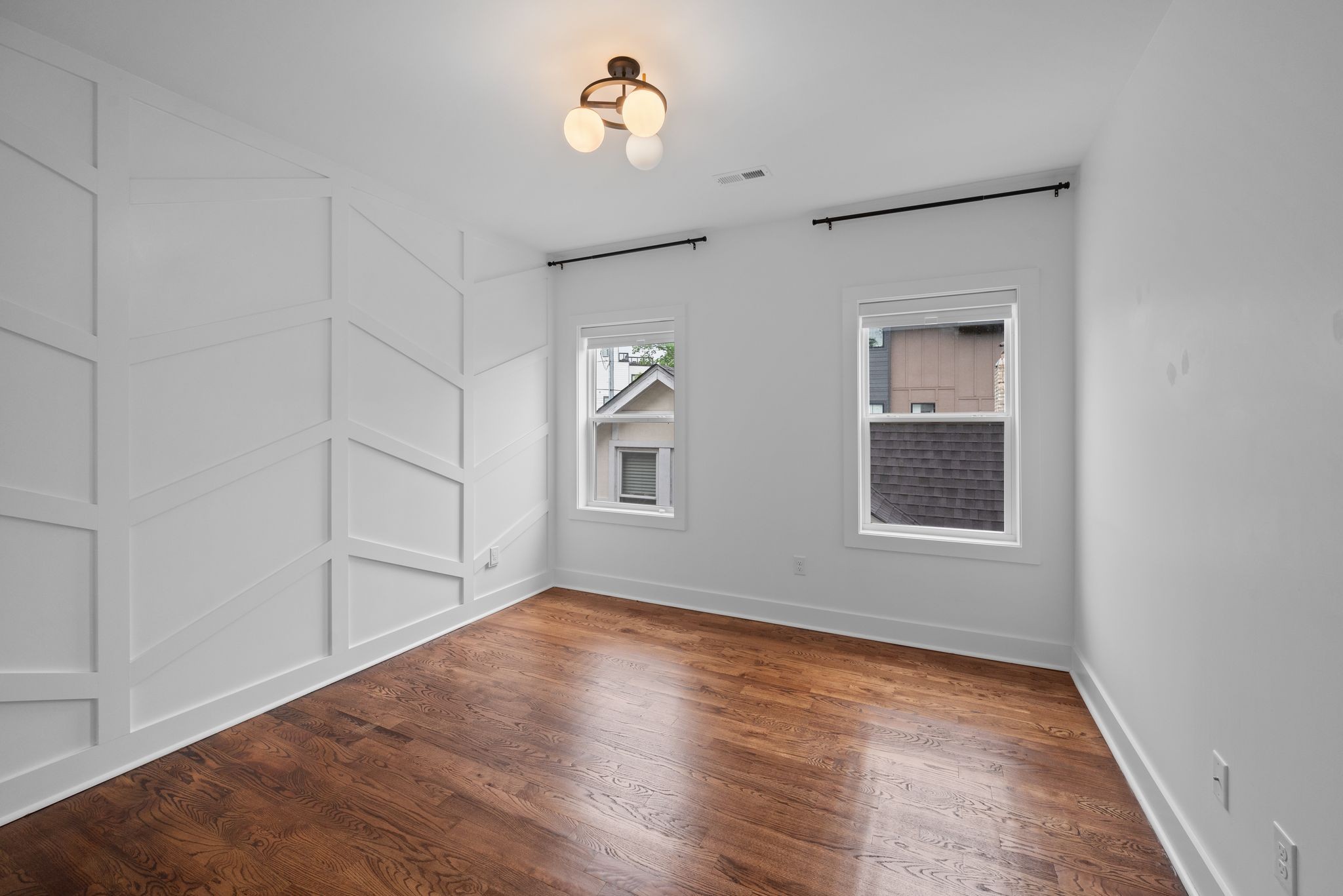 1305 A Lischey Avenue Nashville, TN 37207 - Photo 21 of 30 an empty room with wooden floor and windows