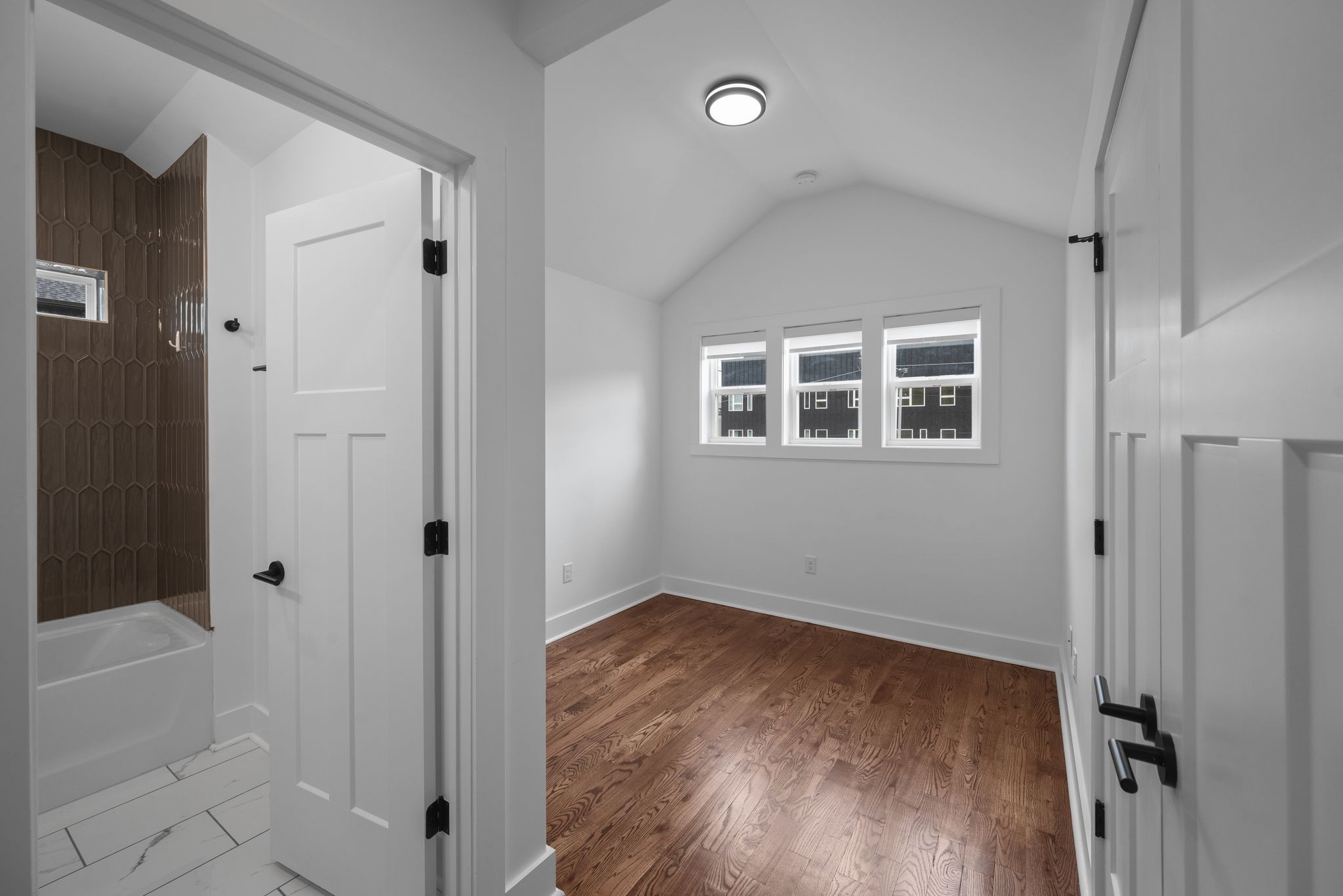 1305 A Lischey Avenue Nashville, TN 37207 - Photo 24 of 30 wooden floor in an empty room with a window
