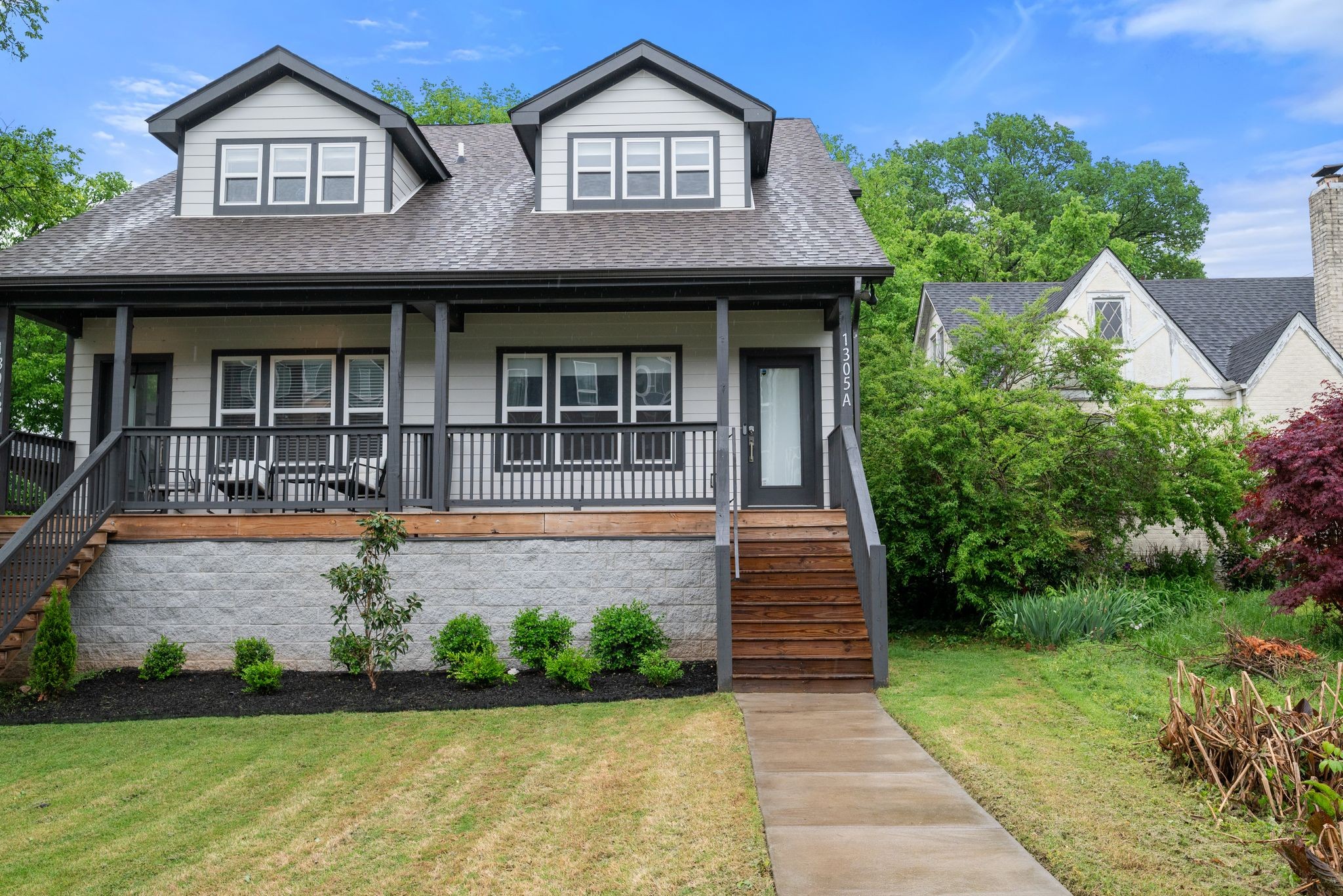 1305 A Lischey Avenue Nashville, TN 37207 - Photo 3 of 30 a front view of a house with garden