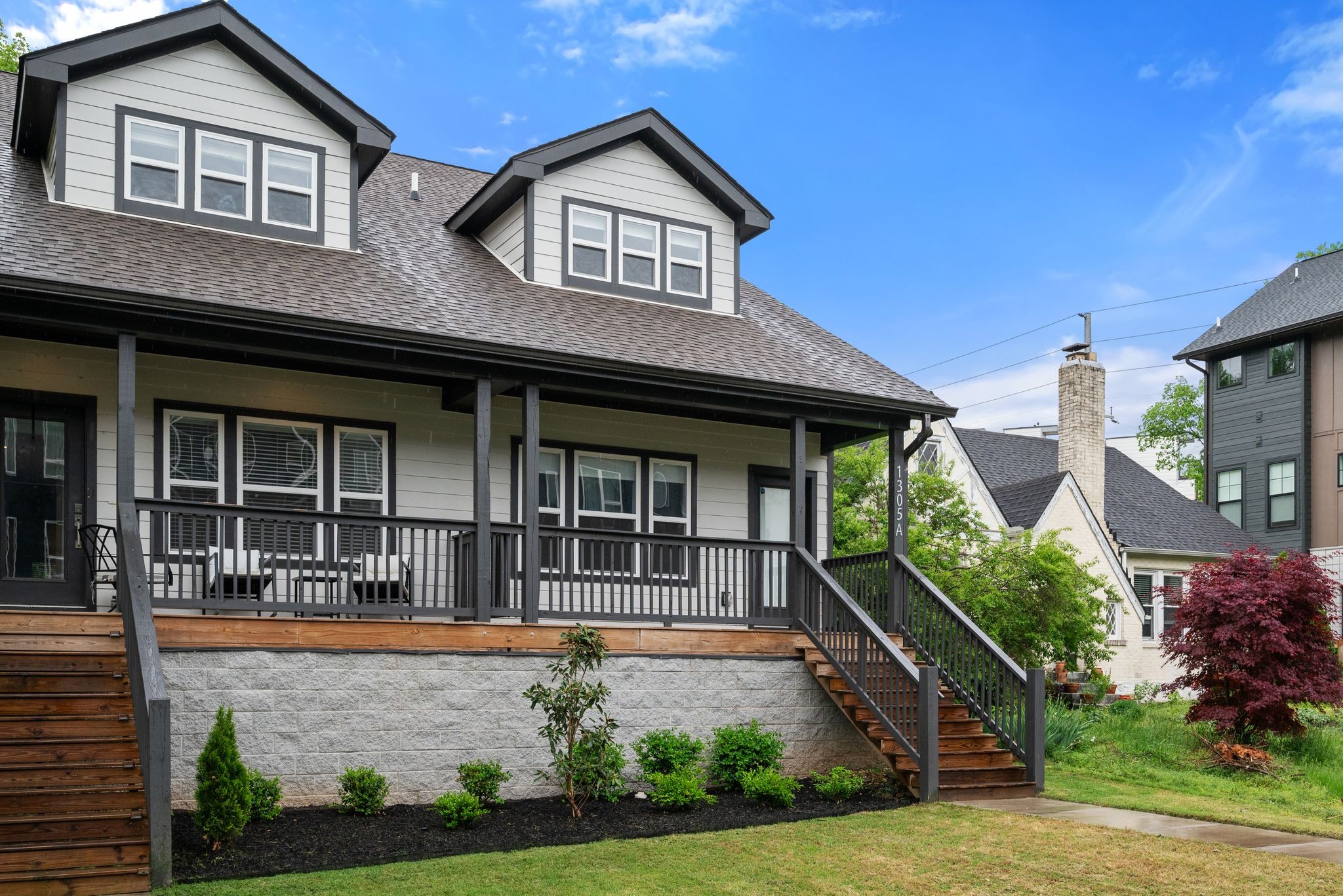 1305 A Lischey Avenue Nashville, TN 37207 - Photo 4 of 30 a front view of a house with garden