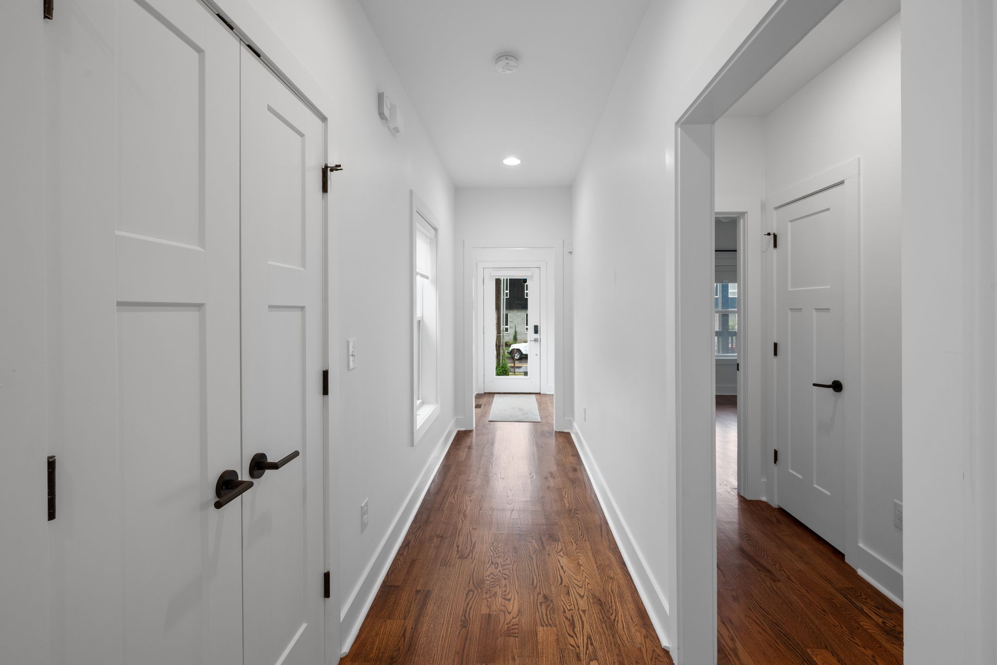 1305 A Lischey Avenue Nashville, TN 37207 - Photo 7 of 30 a view of a hallway with wooden floor and closet area