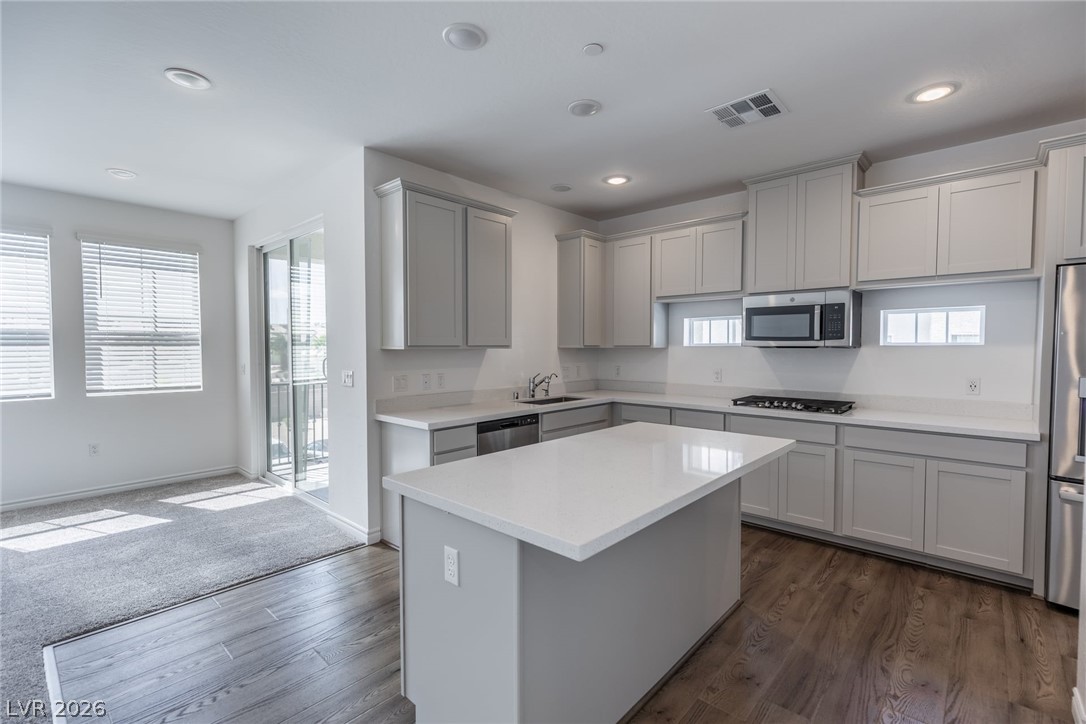 2555 Hampton Road, Unit 8206 Henderson, NV 89052 - Photo 3 of 35 This modern kitchen features a spacious island and bright natural light.