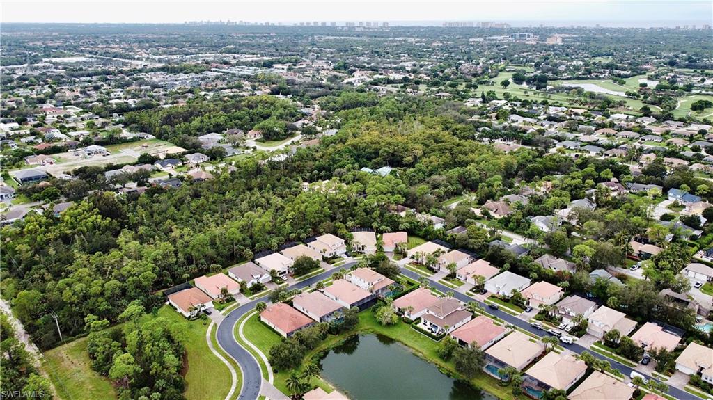 16152 Parque Lane Naples, FL 34110 - Photo 36 of 49 Birds eye view of property with a water view