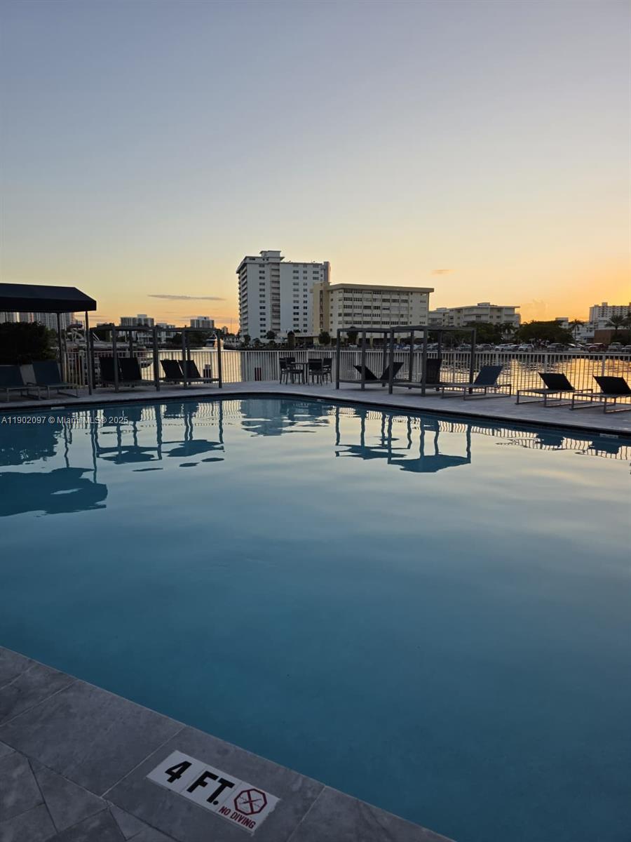 1833 South Ocean Drive, Unit 809 Hallandale Beach, FL 33009 - Photo 1 of 26 a view of a terrace with sitting area