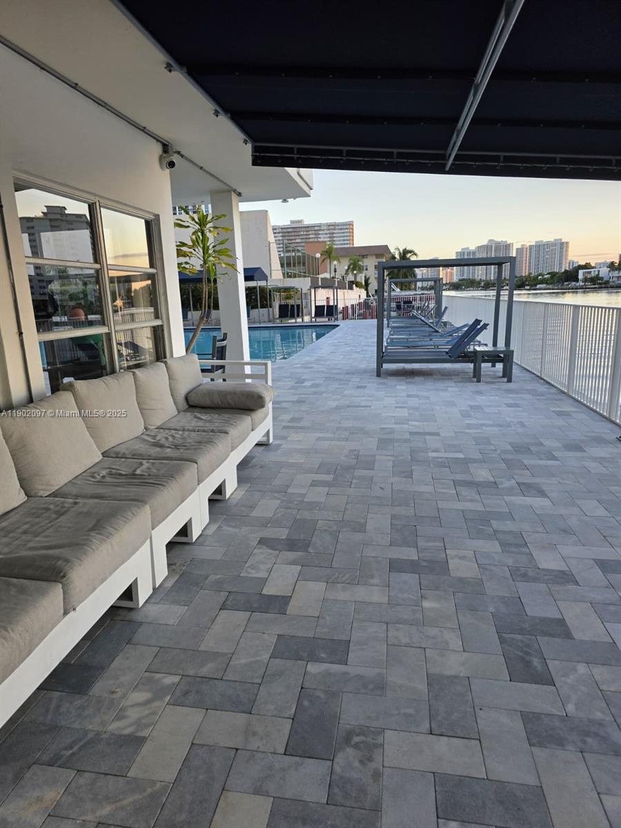 1833 South Ocean Drive, Unit 809 Hallandale Beach, FL 33009 - Photo 2 of 26 a view of outdoor space with seating area