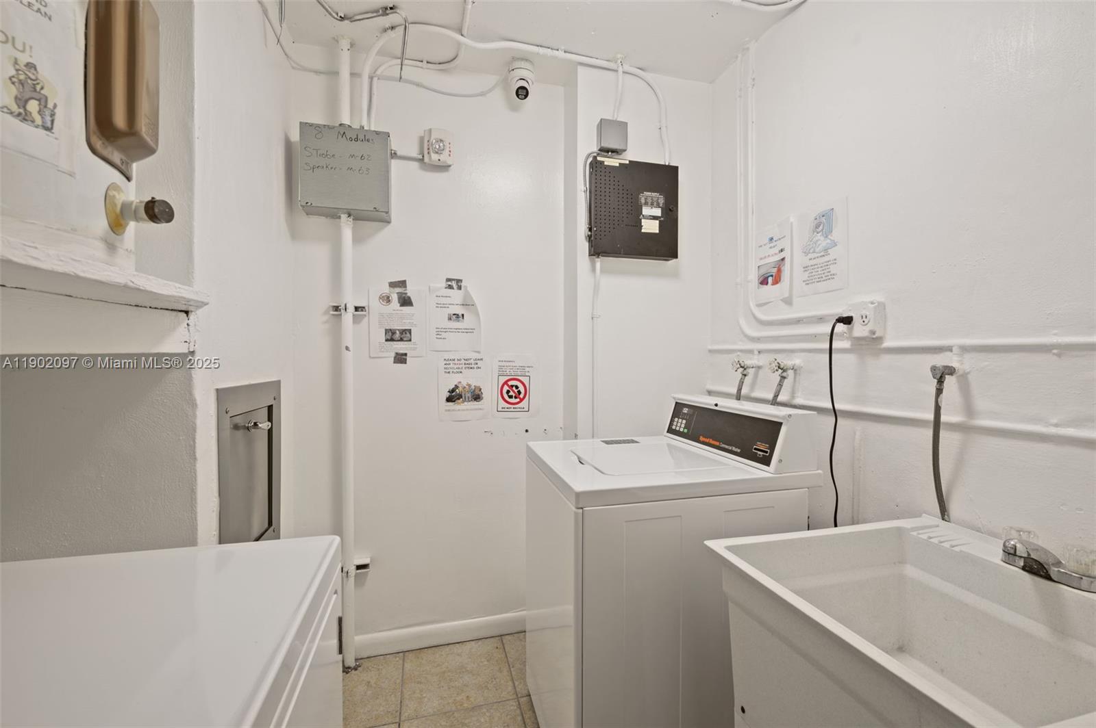 1833 South Ocean Drive, Unit 809 Hallandale Beach, FL 33009 - Photo 26 of 26 a bathroom with a sink and mirror