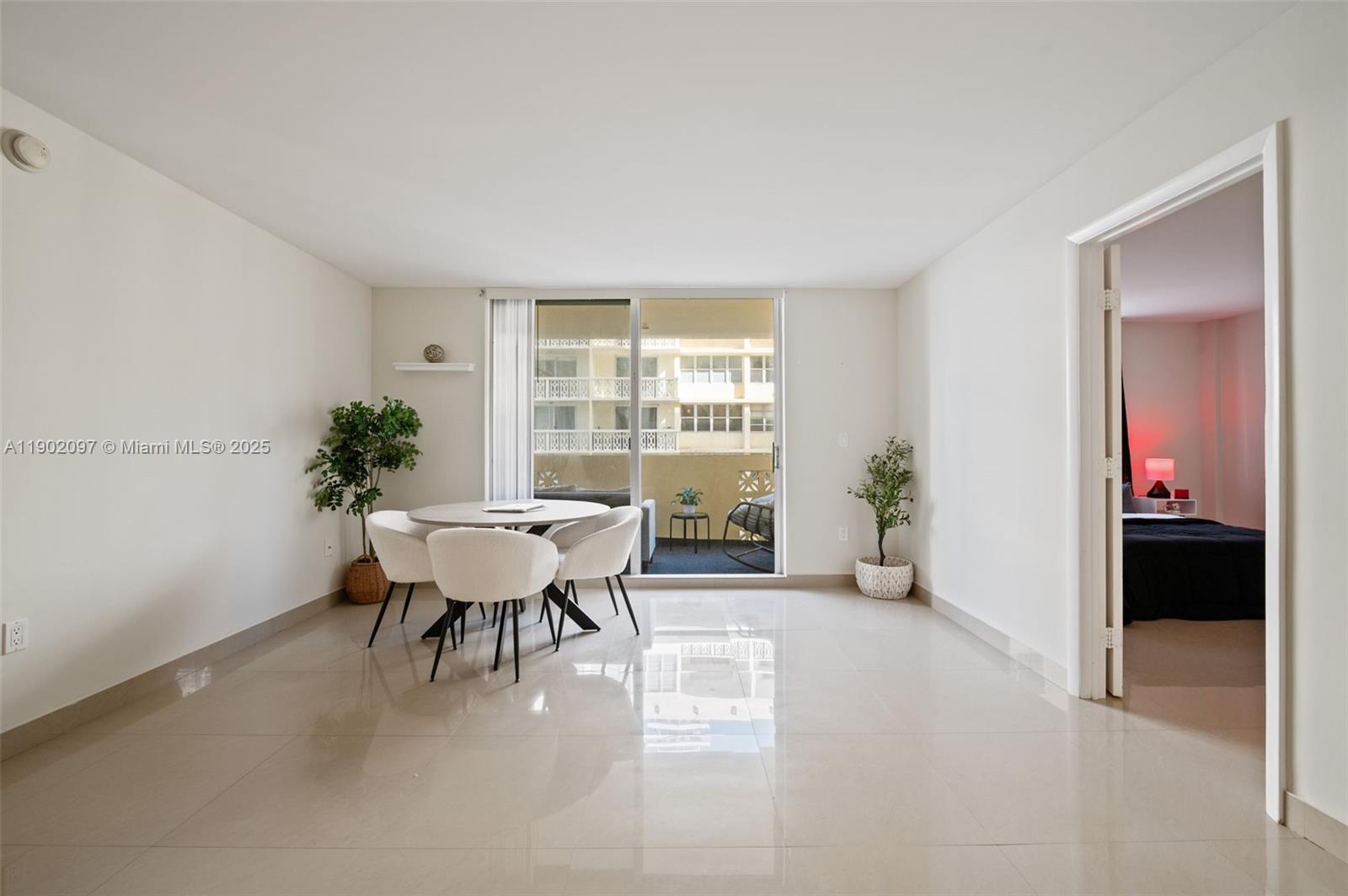 1833 South Ocean Drive, Unit 809 Hallandale Beach, FL 33009 - Photo 8 of 26 a view of a dining room with furniture window and outside view