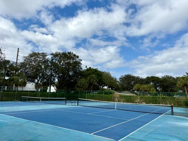 3939 Northeast 5th Avenue, Unit B102 Boca Raton, FL 33431 - Photo 19 of 20 a view of a tennis court
