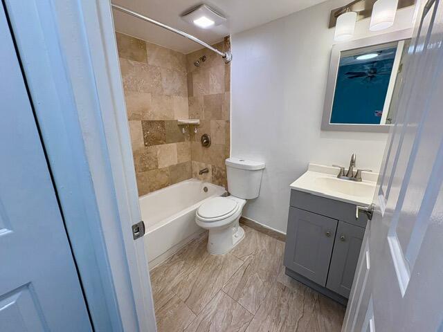 3939 Northeast 5th Avenue, Unit B102 Boca Raton, FL 33431 - Photo 10 of 20 a bathroom with a sink a toilet and shower