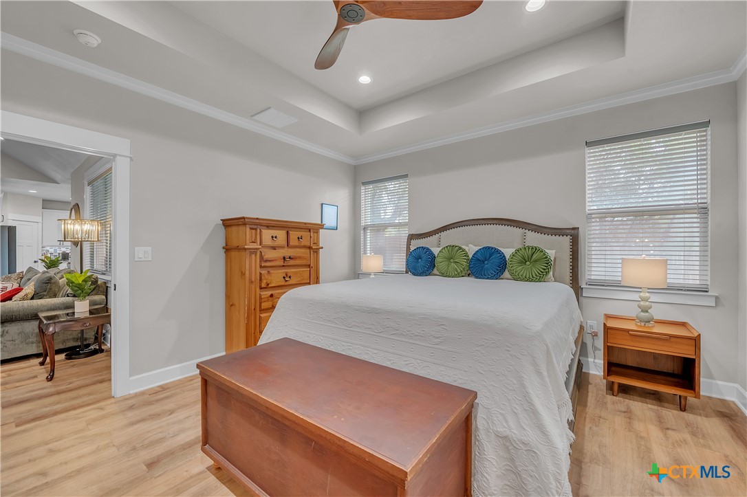 1601 Badger Lane Lampasas, TX 76550 - Photo 20 of 29 a bedroom with a bed and wooden floor