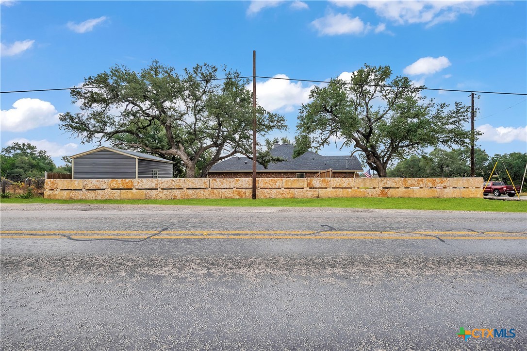 1601 Badger Lane Lampasas, TX 76550 - Photo 28 of 29 a view of a swimming pool with an outdoor space and seating area