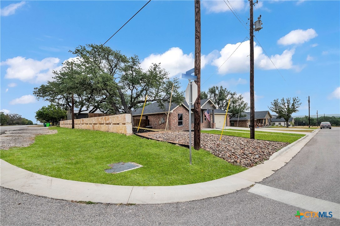 1601 Badger Lane Lampasas, TX 76550 - Photo 29 of 29 a view of a house with a backyard porch and sitting area